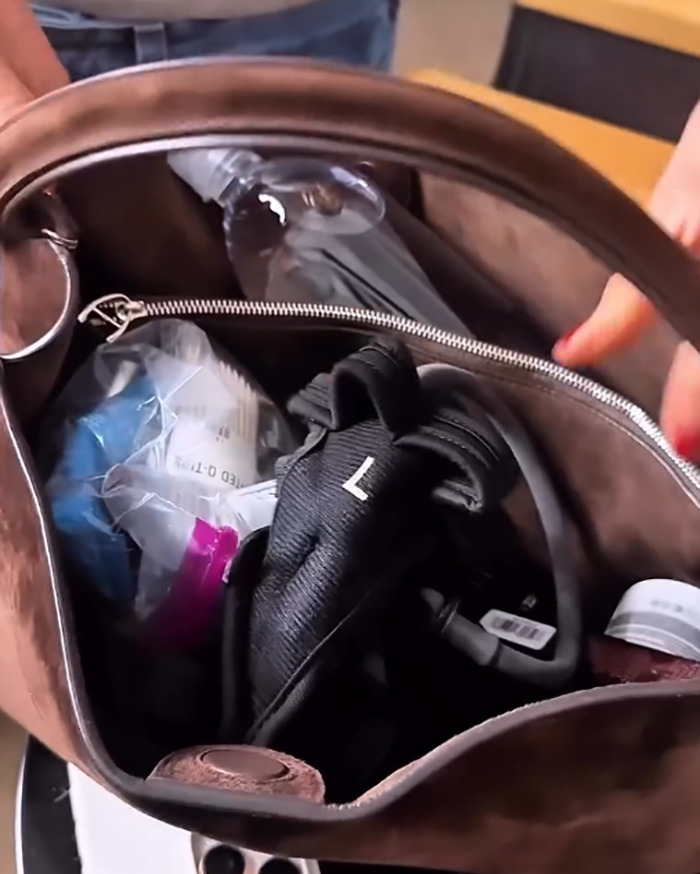 Jennifer Aniston’s Accidental Purse Reveal Goes Viral After Fans Spot Totally Relatable Items