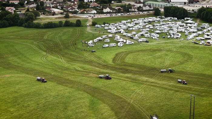 Photographer Reveals The Full Story After Farmer Goes Viral For Spraying Squatters With Manure