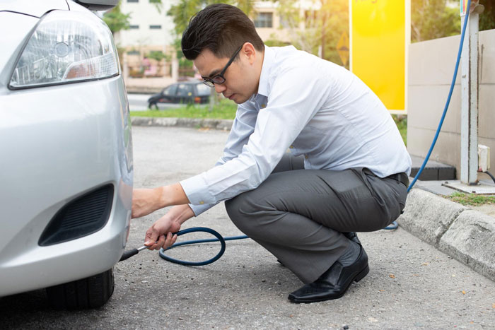 Lady In Brand New Lexus Skips Air Pump Line, Ends Up Trapped Between Curbs And Petty Justice
