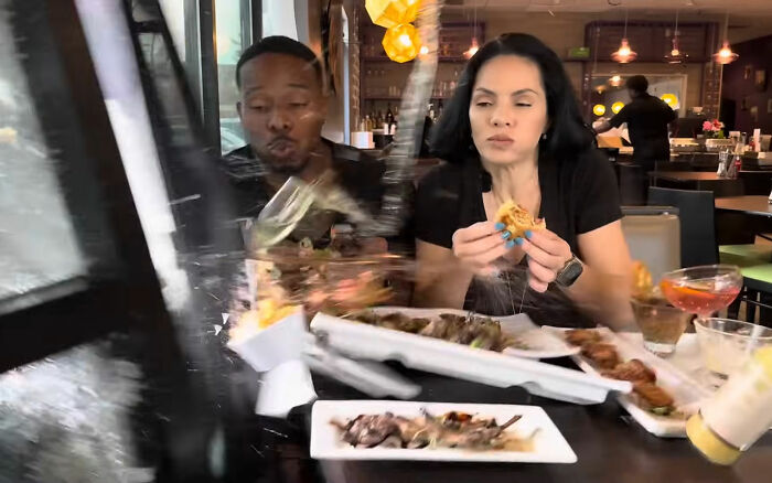 Terrifying Footage Shows SUV Crashing Into Couple Eating Inside A Restaurant
