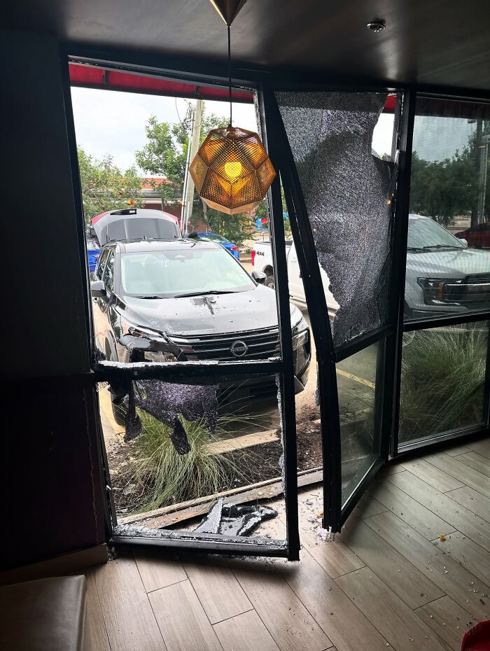 Terrifying Footage Shows SUV Crashing Into Couple Eating Inside A Restaurant