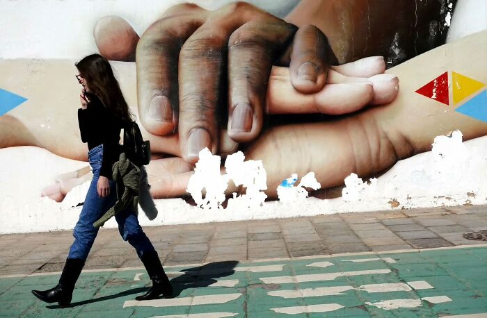 Photographer Captures 50 Of Life’s Unseen, Unposed Moments On The Streets