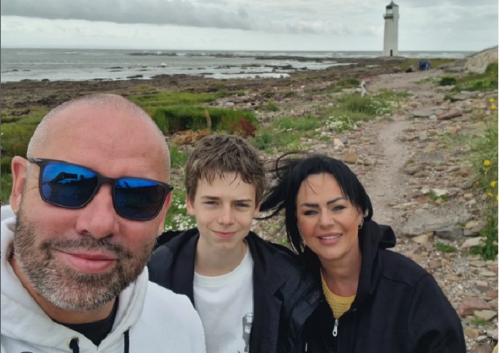 Alfie Williams and his parents