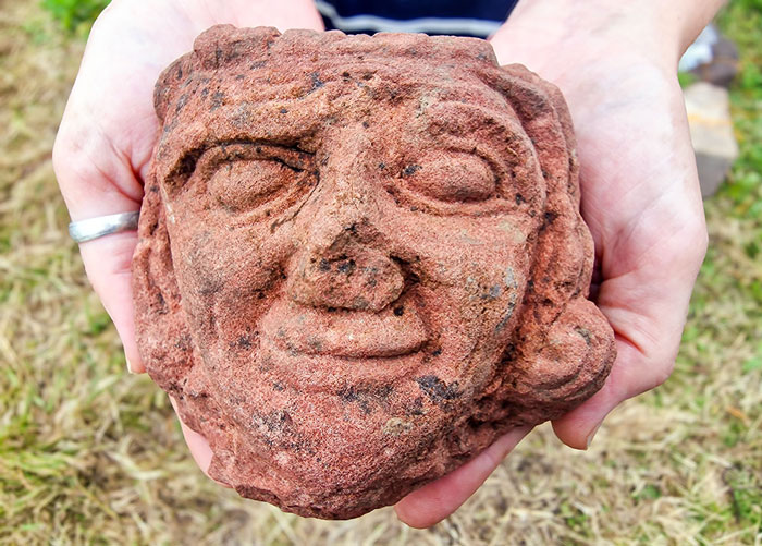 Experts Stunned By Archaeology Student’s Discovery Of Ancient Head Carving With “Unusual” Features