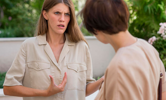 “Curious”: Neighbor Admits Her Mom Drilled Holes In Fence To Spy, Then Denies Taunting Dogs