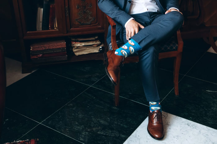 Woman Mocks Colleague’s Penguin Socks, Red-Faced When He Says Late Wife Knitted Them For Him