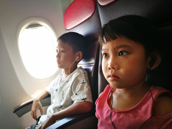 Family Tries Guilt-Tripping A Passenger Into Swapping Aisle Seat For Middle Seat, Gets Shut Down