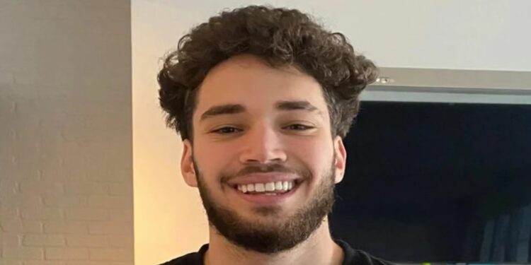 Adin Ross smiling hard