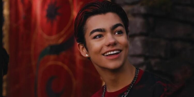 malachi barton smiling red background