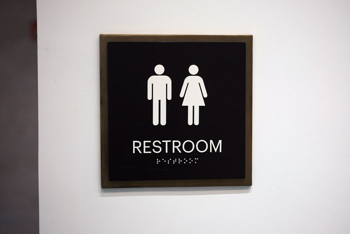 Lady Reports Gay Colleague To HR For Constantly Using Women&#8217;s Restroom, He Calls Her Out