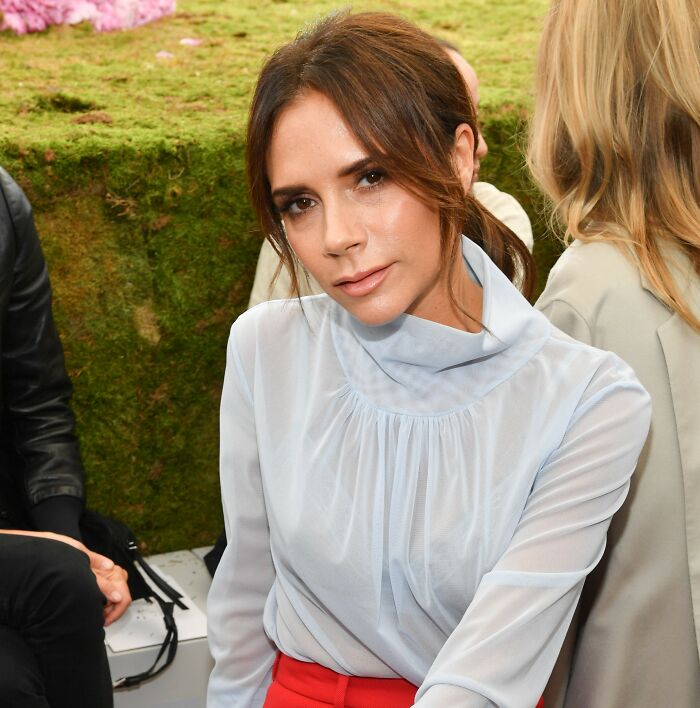 Victoria Beckham Finally Explains Why She “Never Smiled” After Being Labeled A “Miserable Cow”