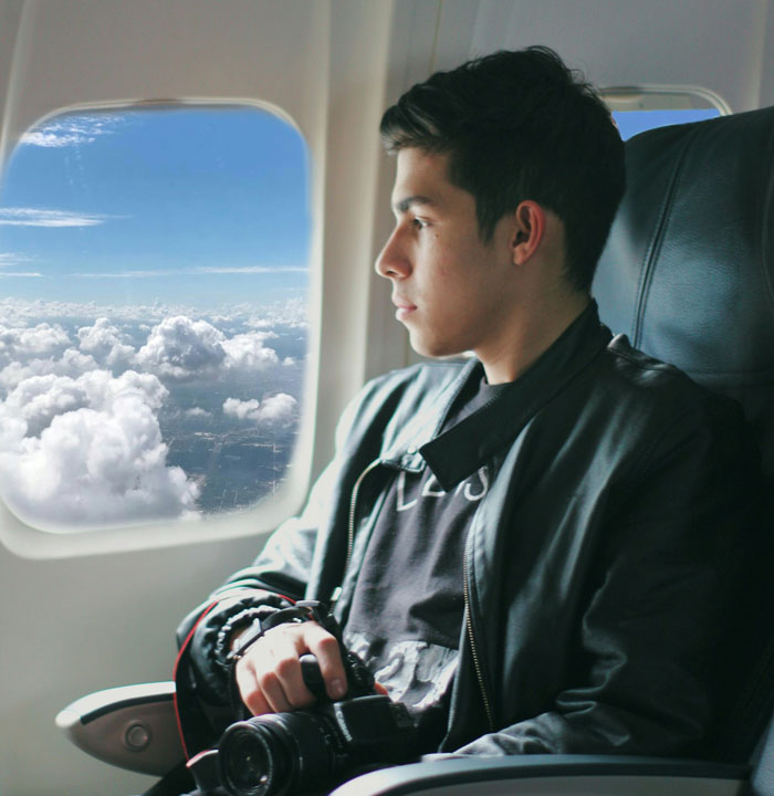 Guy Makes Kid Cry Multiple Times On A Plane After Saying &#8220;No,&#8221; Mom Calls Him Out