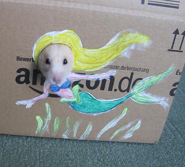 Girl Dresses Hamster Up In Cute Cardboard Costumes (4 pics) Girl Dresses Hamster Up In Cute Cardboard Costumes (4 pics)