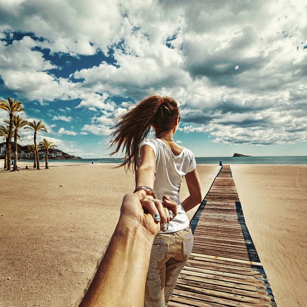 Photographer Continues to Follow His Girlfriend Around The World