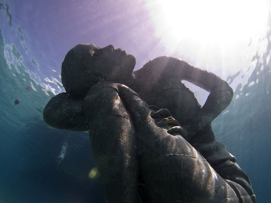 Ocean Atlas: Massive Underwater Statue Of Girl Carrying The Ocean On Her Shoulders Ocean Atlas: Massive Underwater Statue Of Girl Carrying The Ocean On Her Shoulders
