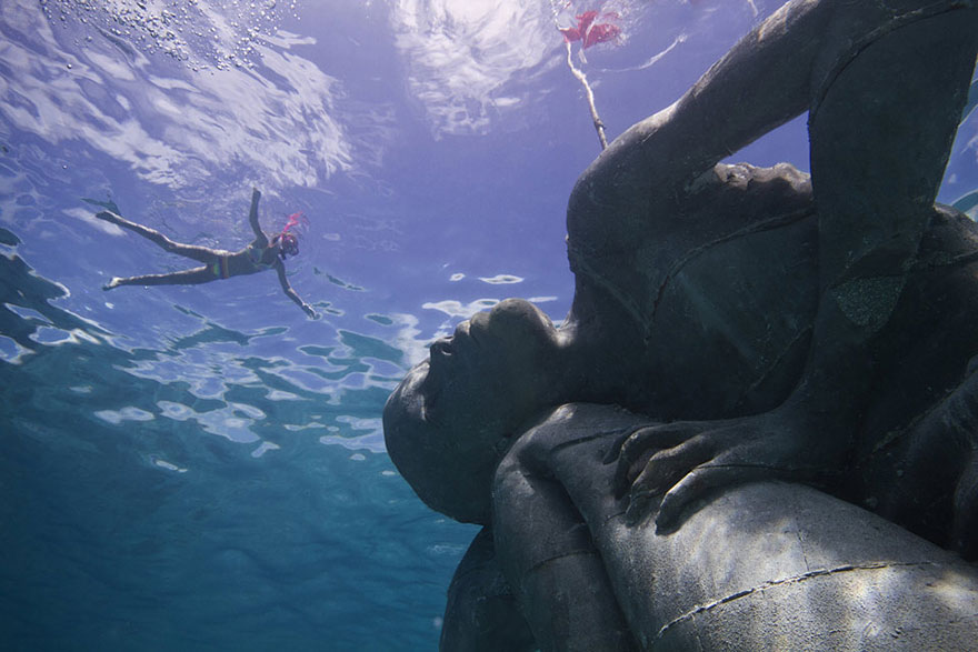 Ocean Atlas: Massive Underwater Statue Of Girl Carrying The Ocean On Her Shoulders Ocean Atlas: Massive Underwater Statue Of Girl Carrying The Ocean On Her Shoulders