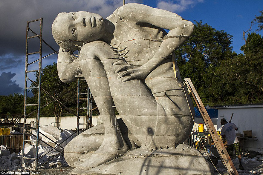 Ocean Atlas: Massive Underwater Statue Of Girl Carrying The Ocean On Her Shoulders Ocean Atlas: Massive Underwater Statue Of Girl Carrying The Ocean On Her Shoulders