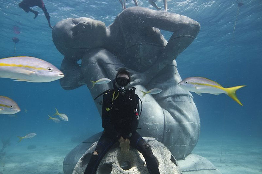 Ocean Atlas: Massive Underwater Statue Of Girl Carrying The Ocean On Her Shoulders Ocean Atlas: Massive Underwater Statue Of Girl Carrying The Ocean On Her Shoulders
