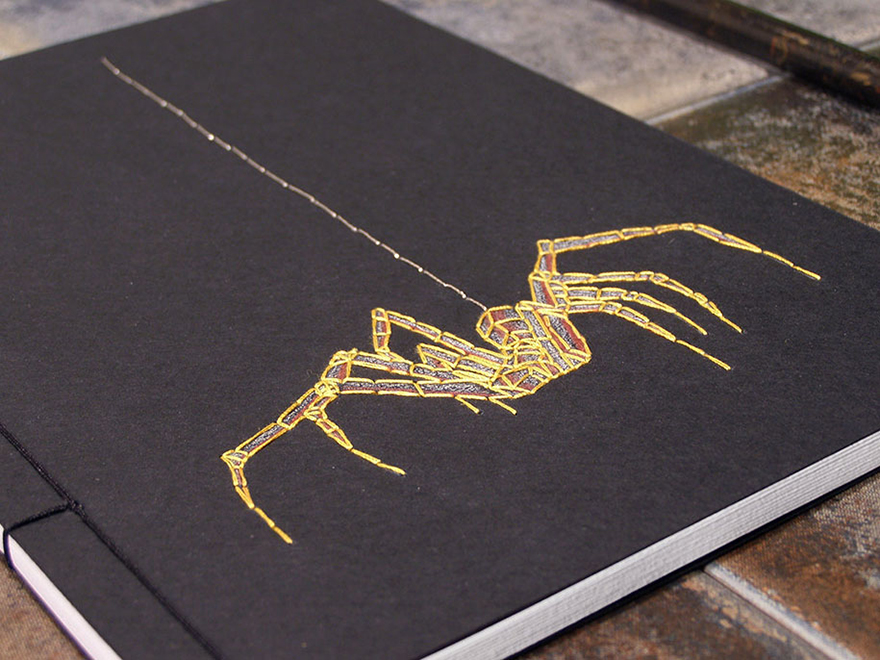 Artist Embroiders Notebook With Veins, Holograms, And Floral Patterns
