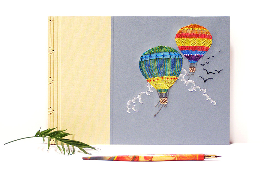 Artist Embroiders Notebook With Veins, Holograms, And Floral Patterns