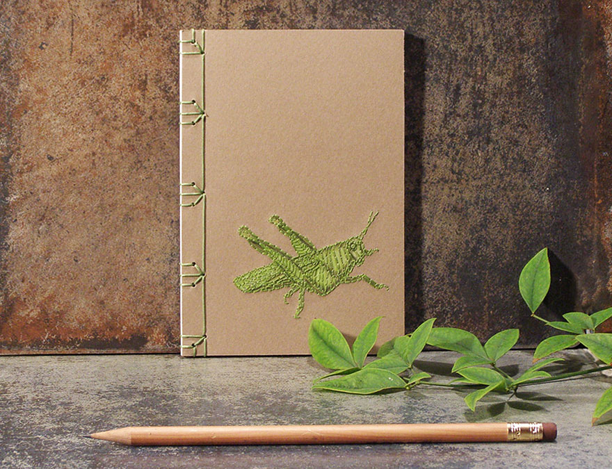 Artist Embroiders Notebook With Veins, Holograms, And Floral Patterns