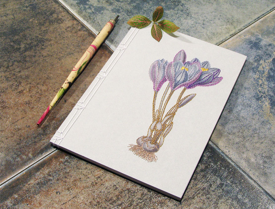 Artist Embroiders Notebook With Veins, Holograms, And Floral Patterns