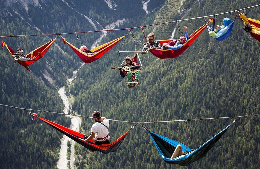 People At This Festival Slept On Hammocks Hanging Hundreds Of Feet Above The Italian Alps