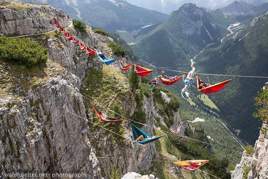 People At This Festival Slept On Hammocks Hanging Hundreds Of Feet Above The Italian Alps