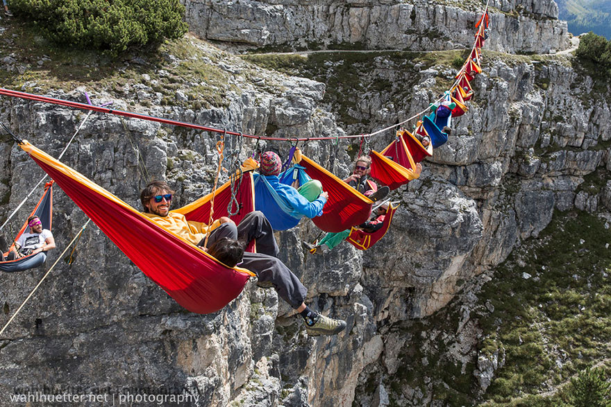 People At This Festival Slept On Hammocks Hanging Hundreds Of Feet Above The Italian Alps