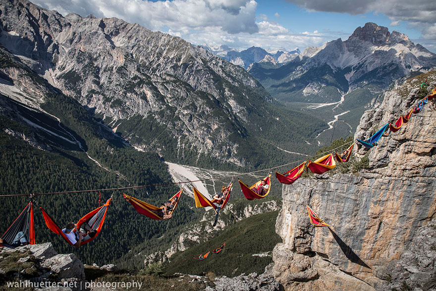 People At This Festival Slept On Hammocks Hanging Hundreds Of Feet Above The Italian Alps