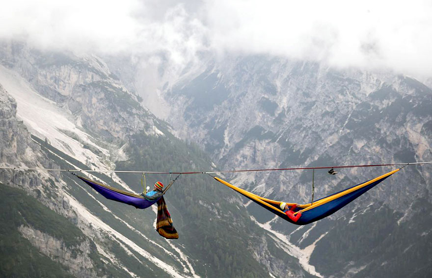 People At This Festival Slept On Hammocks Hanging Hundreds Of Feet Above The Italian Alps