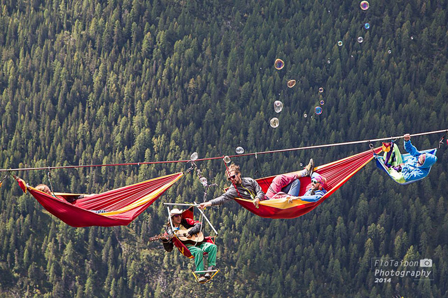 People At This Festival Slept On Hammocks Hanging Hundreds Of Feet Above The Italian Alps