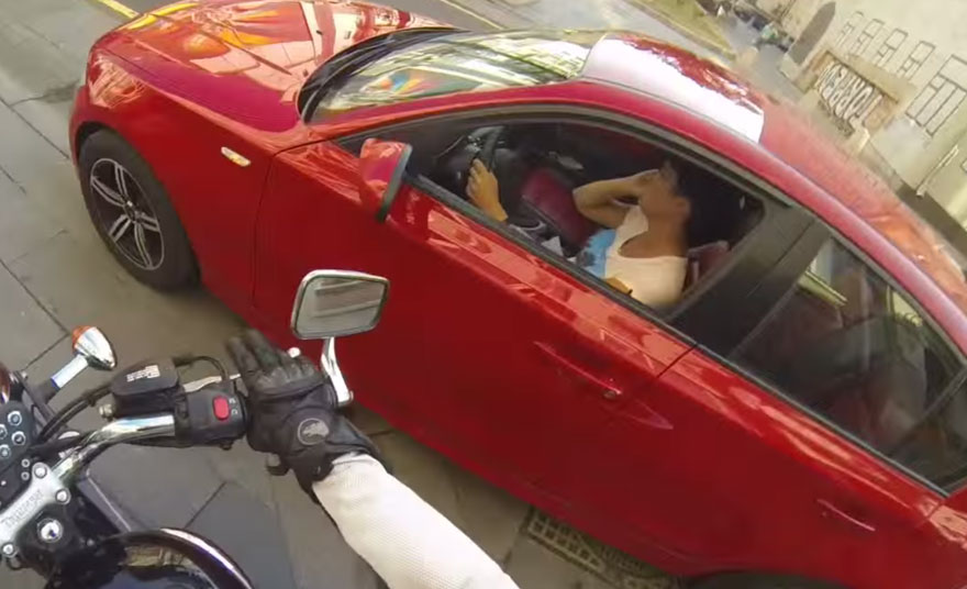 Vigilante Woman On A Motorcycle Chases Down Littering Drivers And Returns Their Trash &#8211; By Force