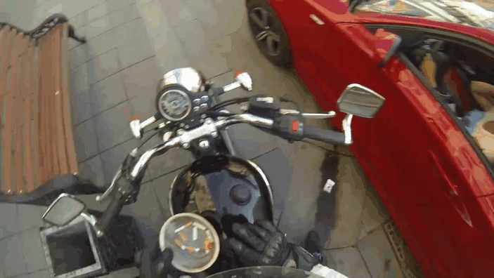 Vigilante Woman On A Motorcycle Chases Down Littering Drivers And Returns Their Trash &#8211; By Force