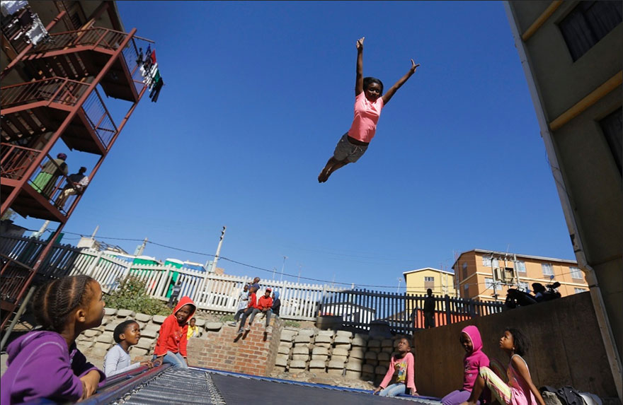 Kids From A Poor Part Of Johannesburg Receive A Trampoline And Soar Through The Air With Glee