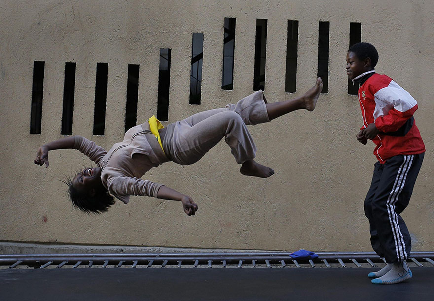 Kids From A Poor Part Of Johannesburg Receive A Trampoline And Soar Through The Air With Glee