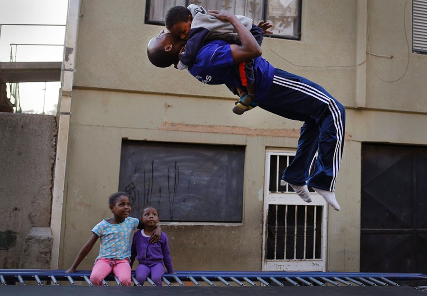 Kids From A Poor Part Of Johannesburg Receive A Trampoline And Soar Through The Air With Glee