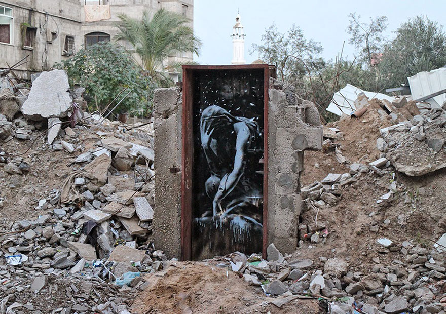 Banksy Sneaks Into Gaza To Create Controversial Street Art