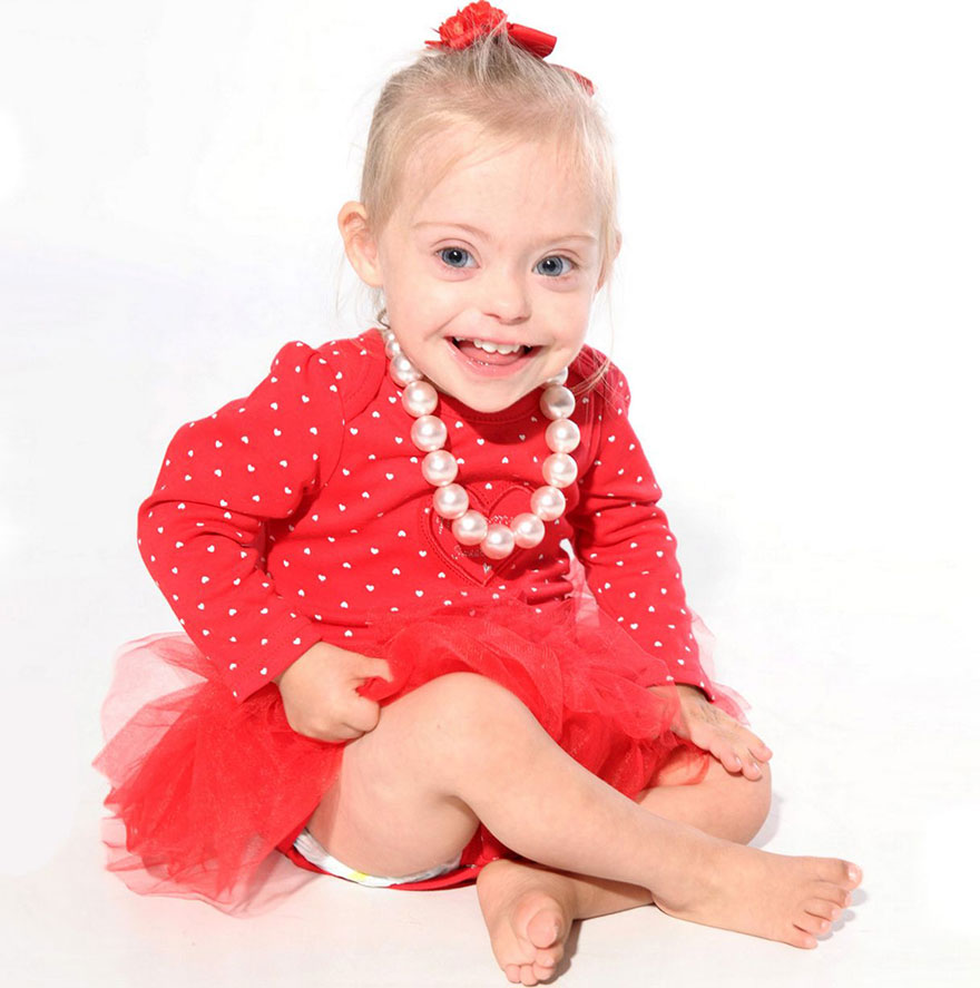 2-Year-Old Girl With Down Syndrome Wins Modeling Contract Thanks To Her Cheeky Smile 2-Year-Old Girl With Down Syndrome Wins Modeling Contract Thanks To Her Cheeky Smile
