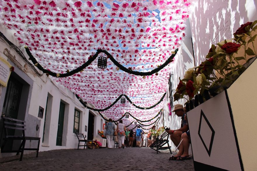1000s Of Handmade Paper Flowers Cover The Streets Of Alentejo, Portugal 1000s Of Handmade Paper Flowers Cover The Streets Of Alentejo, Portugal