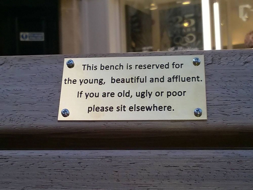 City Council Searches For Pranksters Who Added Funny Signs To Park Benches City Council Searches For Pranksters Who Added Funny Signs To Park Benches