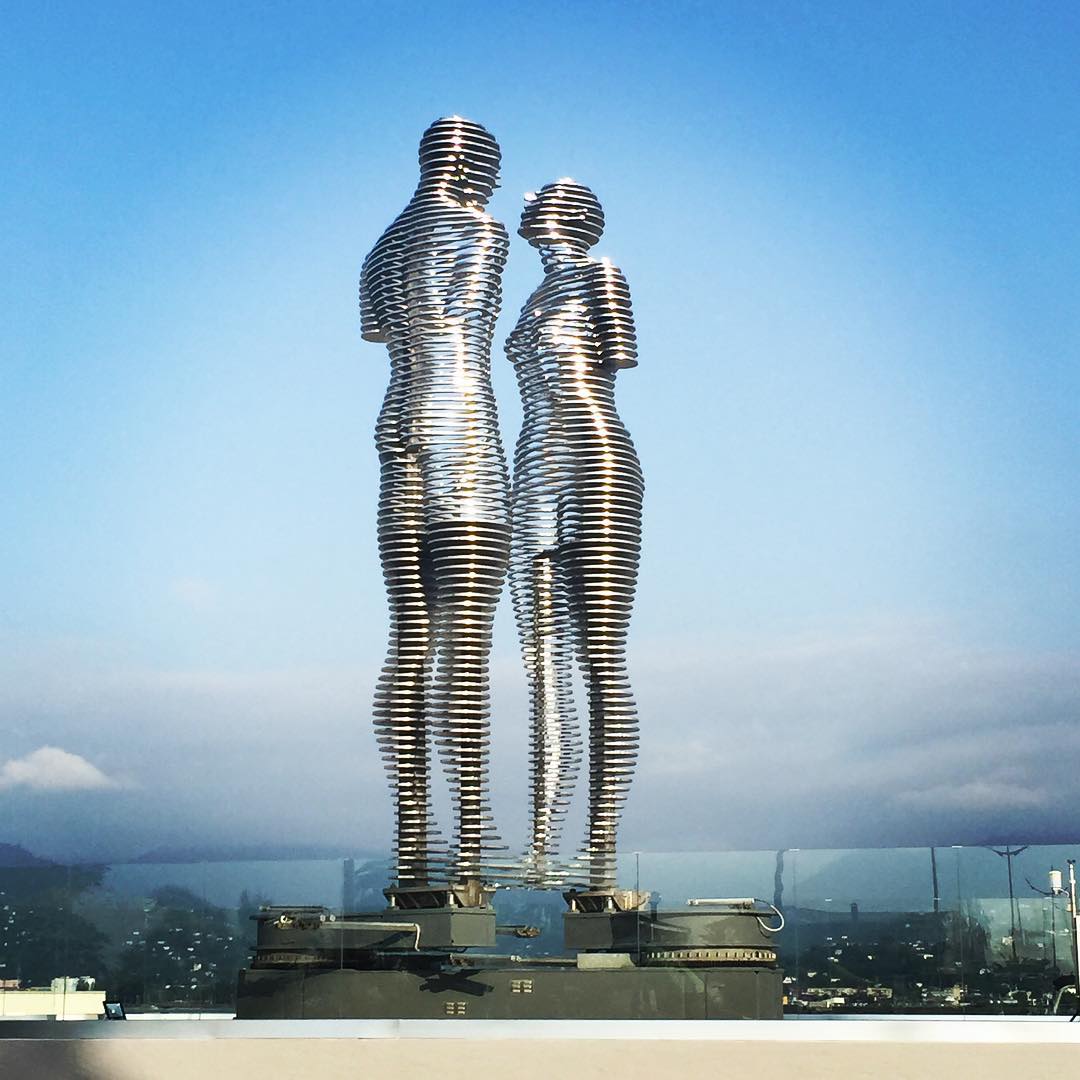 Moving Statues Of A Man And Woman Pass Through Each Other Daily, Symbolizing Tragic Love Story