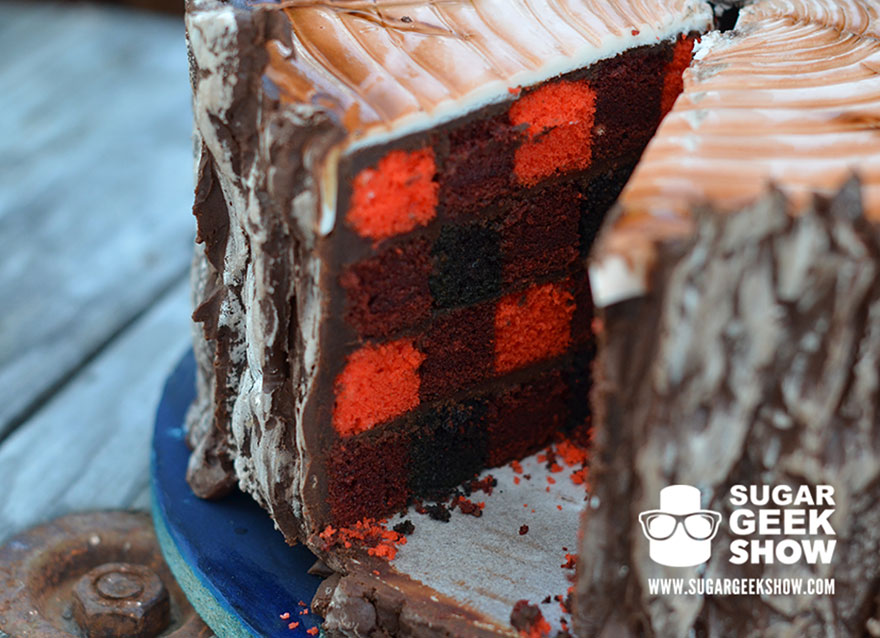 A Lumberjack Cake With An Edible Axe And A Plaid Pattern Inside A Lumberjack Cake With An Edible Axe And A Plaid Pattern Inside