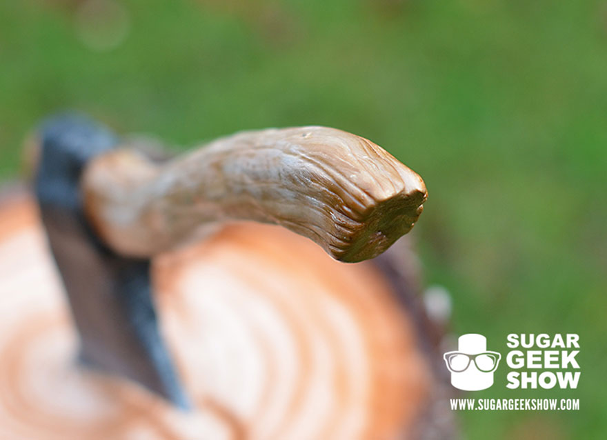 A Lumberjack Cake With An Edible Axe And A Plaid Pattern Inside A Lumberjack Cake With An Edible Axe And A Plaid Pattern Inside