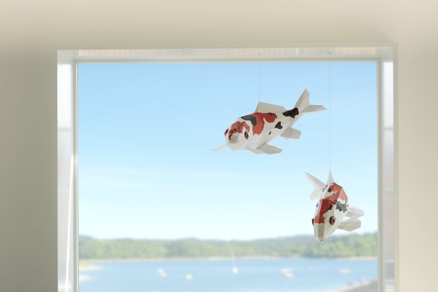 Ceiling Installation Of Koi Fishes Diving In And Out Of The Ceiling