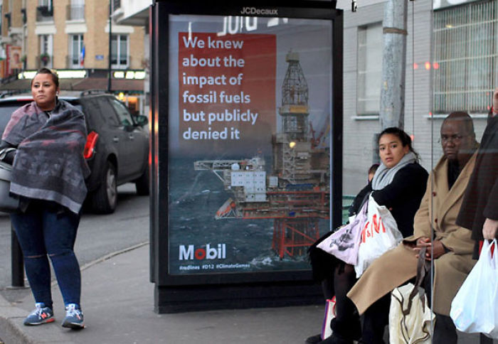 Artists Fill Paris With 600 Fake Ads To Protest Corporate Sponsorship Of Climate Conference Artists Fill Paris With 600 Fake Ads To Protest Corporate Sponsorship Of Climate Conference