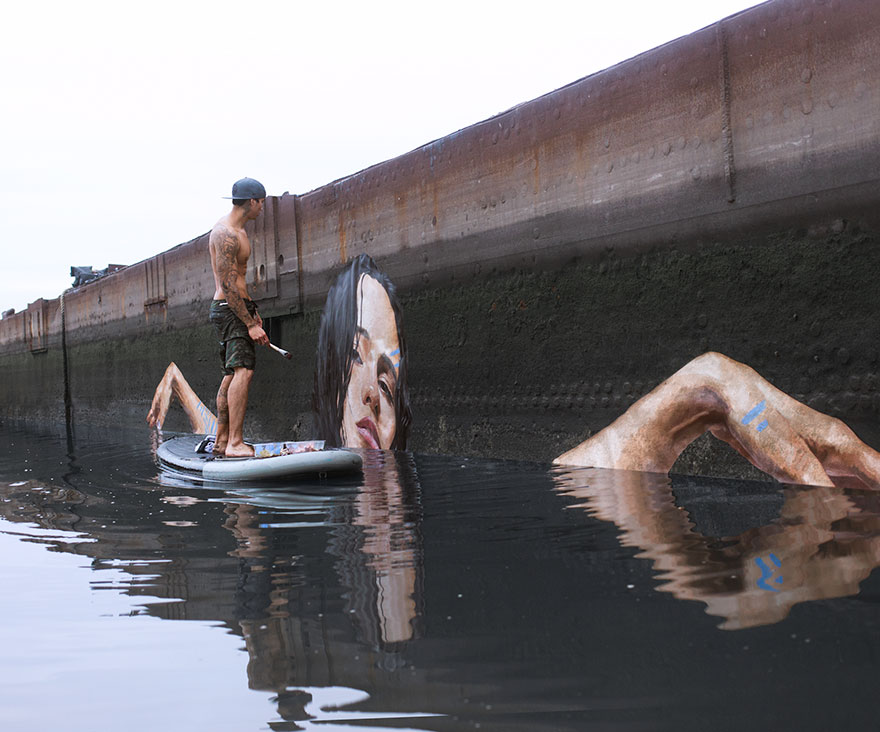 Artist Paints NEW Stunning Seaside Murals While Balancing On A Paddleboard Artist Paints NEW Stunning Seaside Murals While Balancing On A Paddleboard