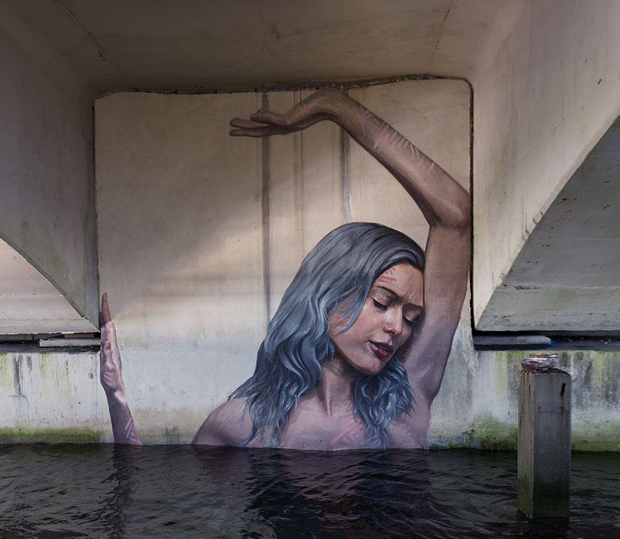 Artist Paints NEW Stunning Seaside Murals While Balancing On A Paddleboard Artist Paints NEW Stunning Seaside Murals While Balancing On A Paddleboard