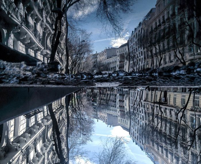 The Parallel Worlds Of Puddles In Spain