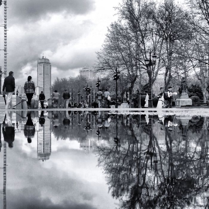 The Parallel Worlds Of Puddles In Spain